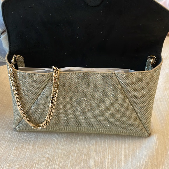 STUART WEITZMAN
The Loveletter Mini Metallic Clutch Bag - Picture 6 of 11